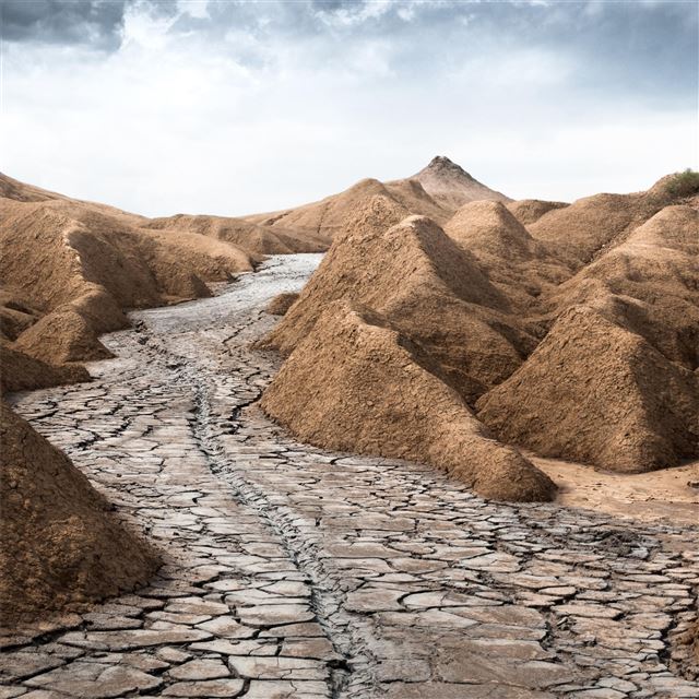 1024x1024 gray dry soil between brown mountains under white ... - mountains iPad Wallpaper
