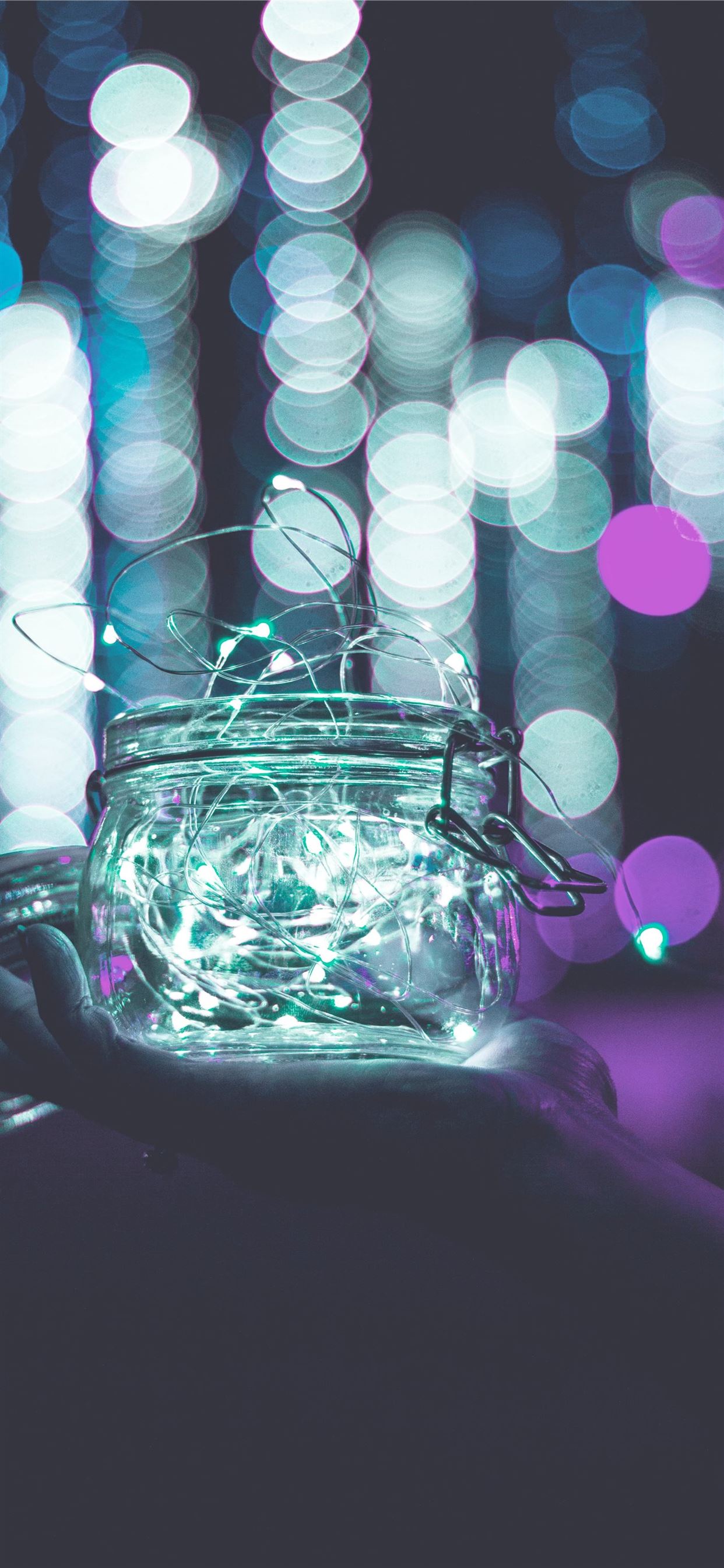 clear glass jar with string lights iPhone 11 Wallpapers Free Download