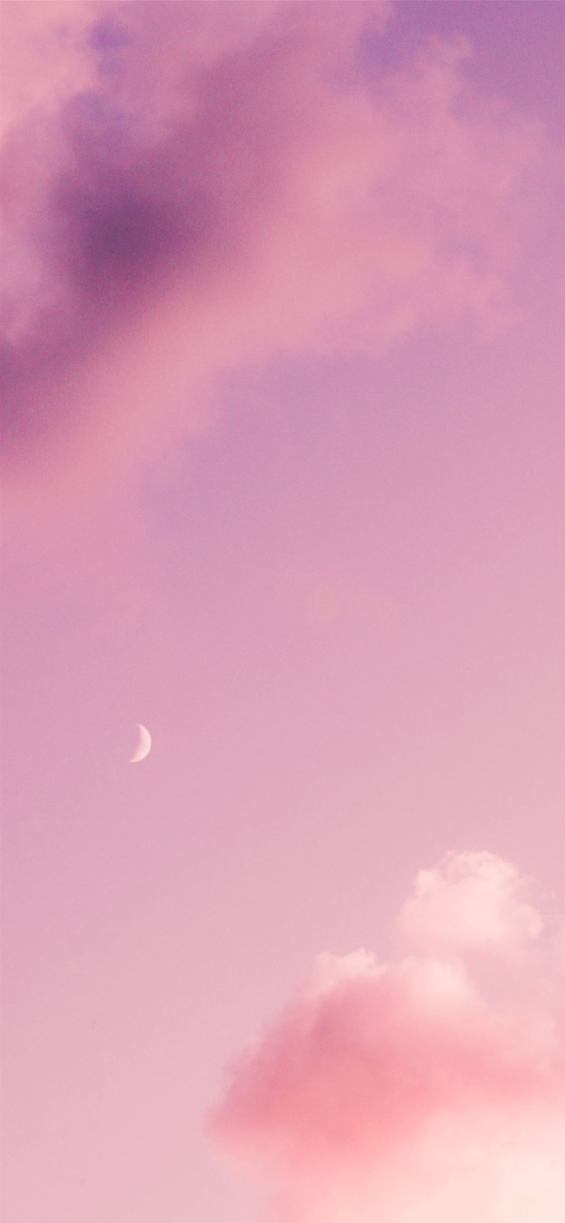 Moon against purple sky iPhone wallpaper 