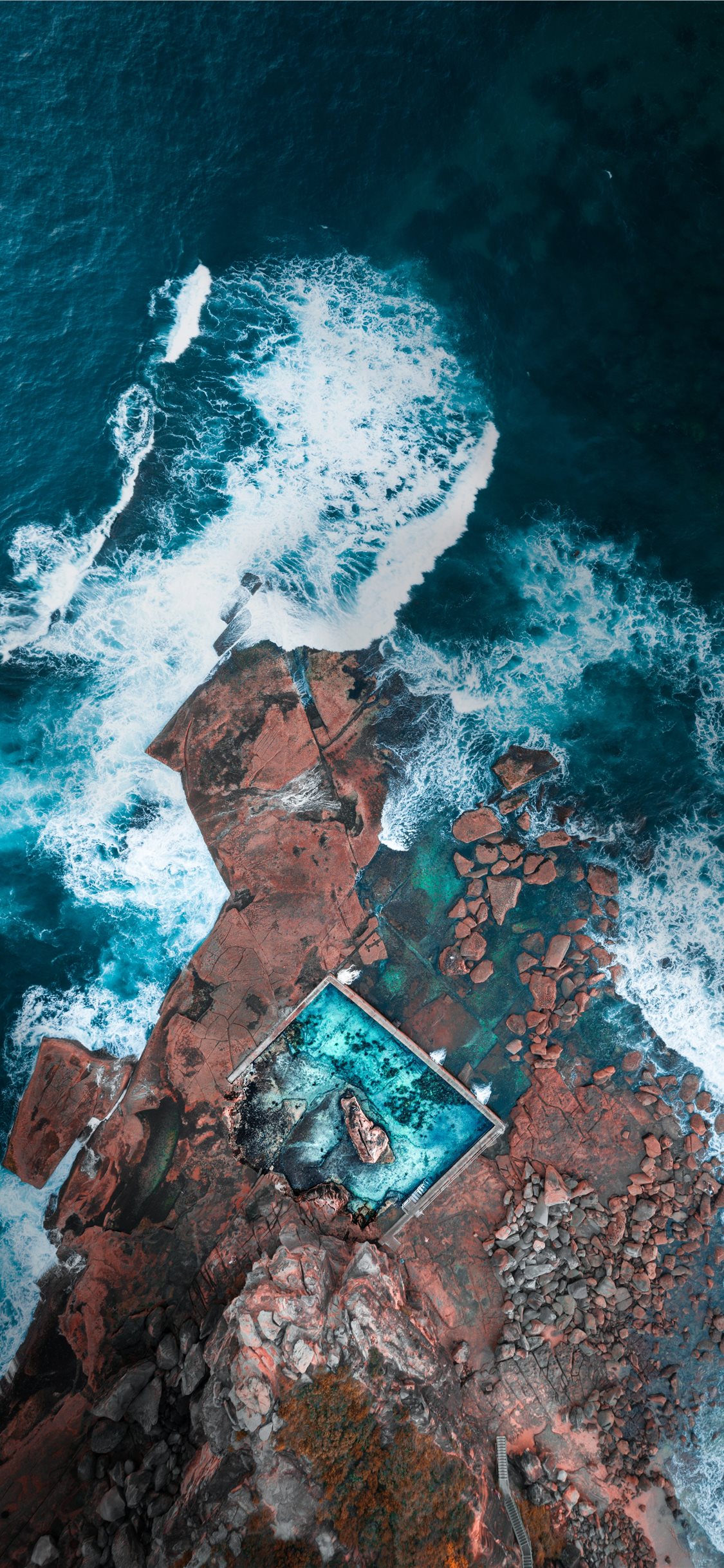 aerial photography of island near ocean iPhone X Wallpapers Free Download