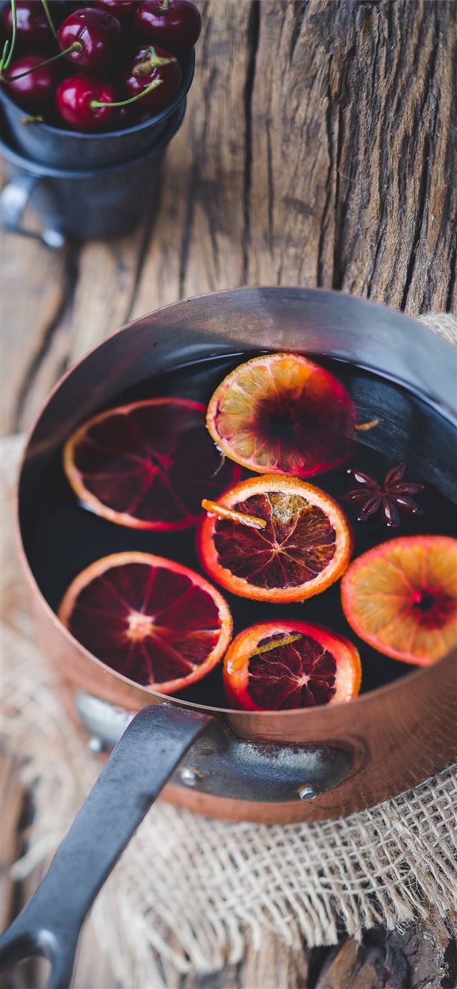 1125x2436 close up photography of sliced orange fruit on bro... - orange iPhone 11 Wallpaper
