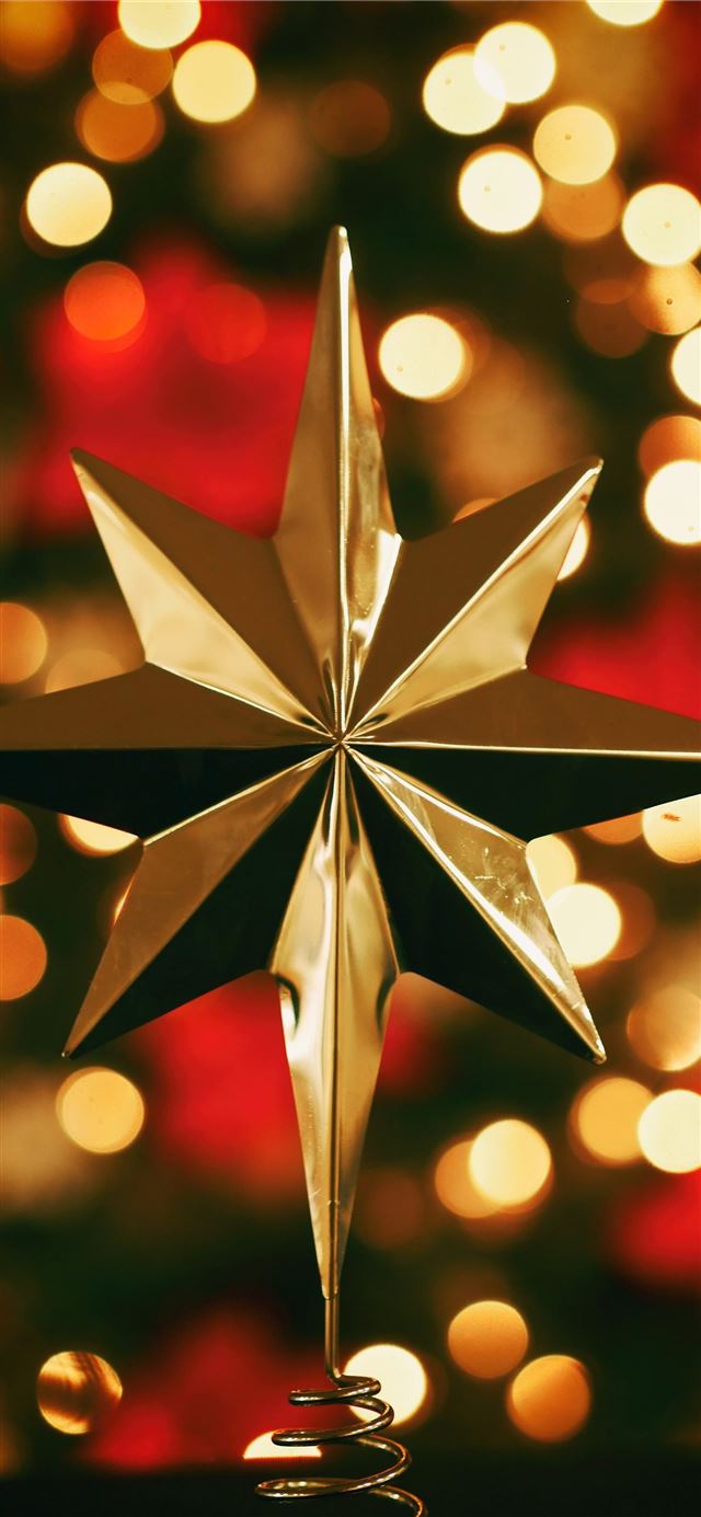1125x2436 bokeh photography of gold star tree topper - gold iPhone 11 Wallpaper