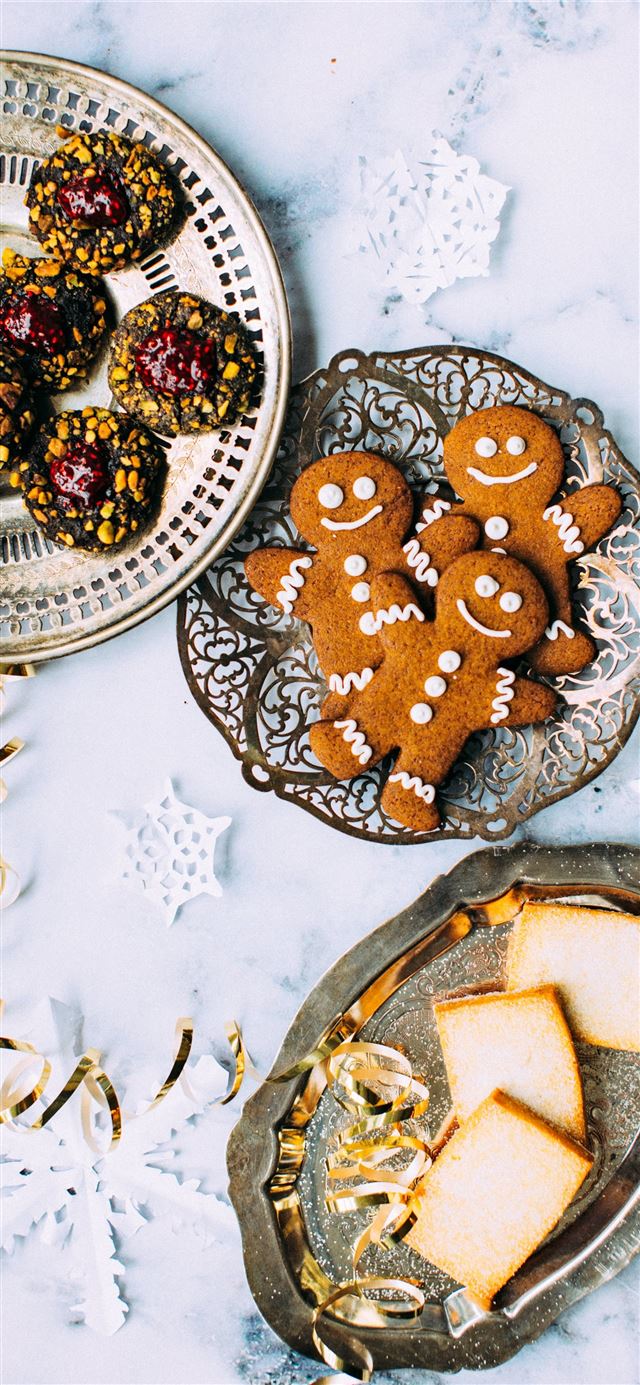 1125x2436 three plates of assorted pastries on plates - winter iPhone 11 Wallpaper