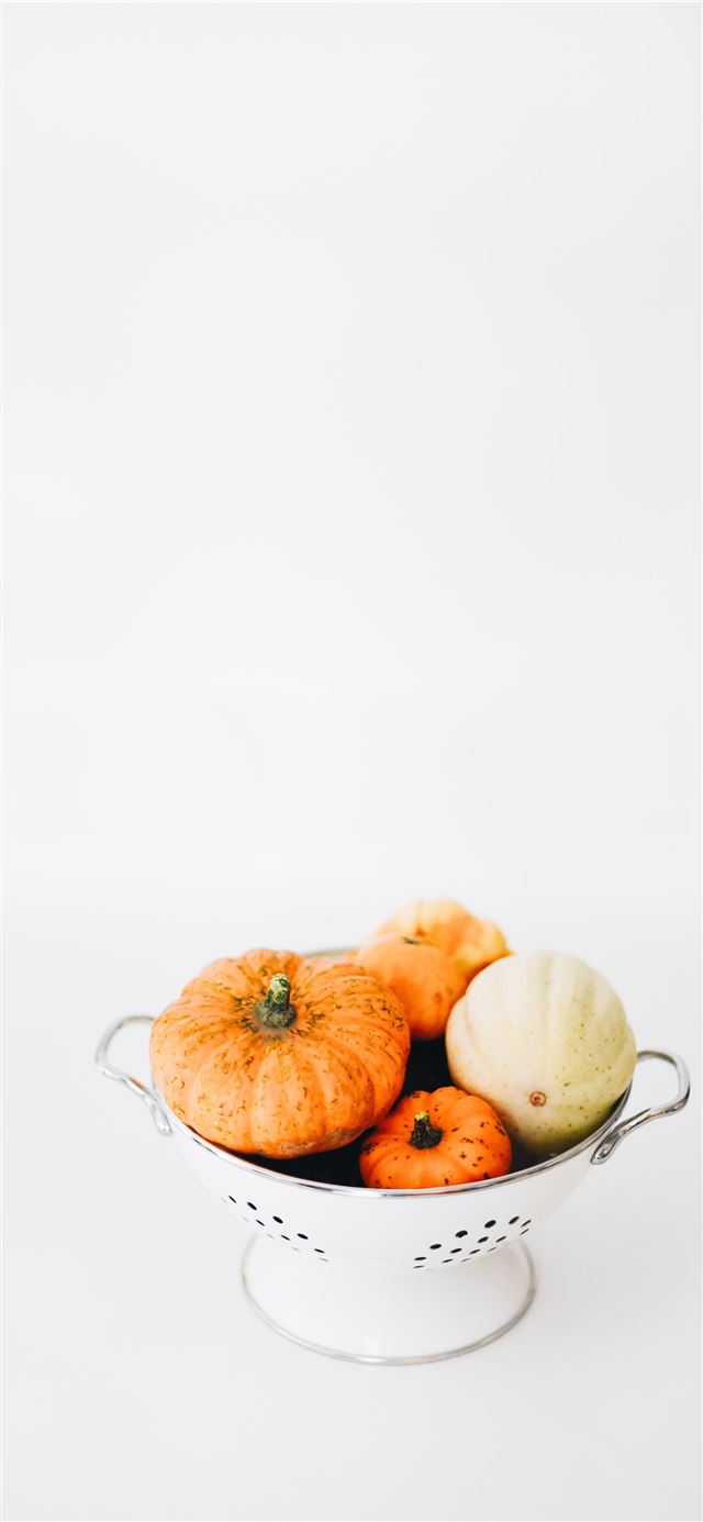 1125x2436 four round orange squashes on colander - thanksgiving iPhone 11 Wallpaper