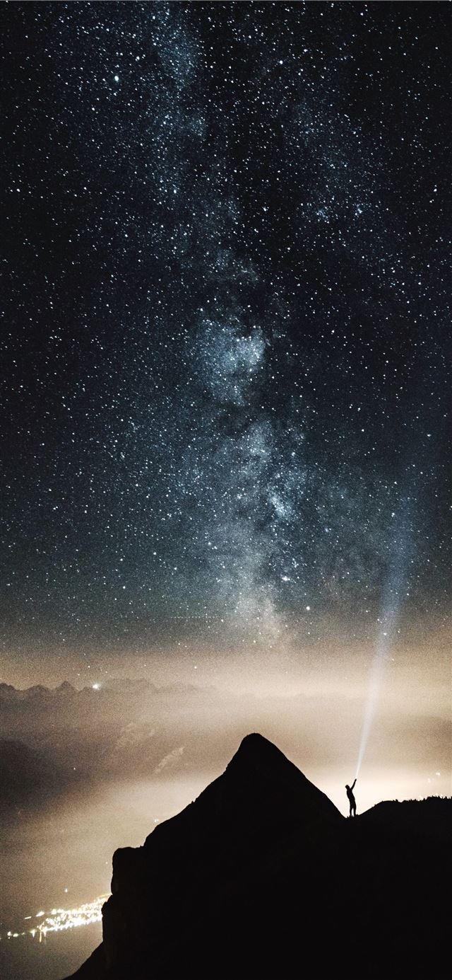 1125x2436 silhouette of person on top of mountain pointing f... - dark (black) iPhone 11 Wallpaper