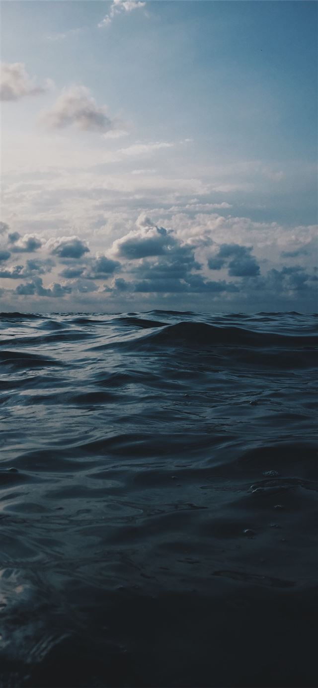 1125x2436 sea under white clouds during daytime -  iPhone 11 Wallpaper