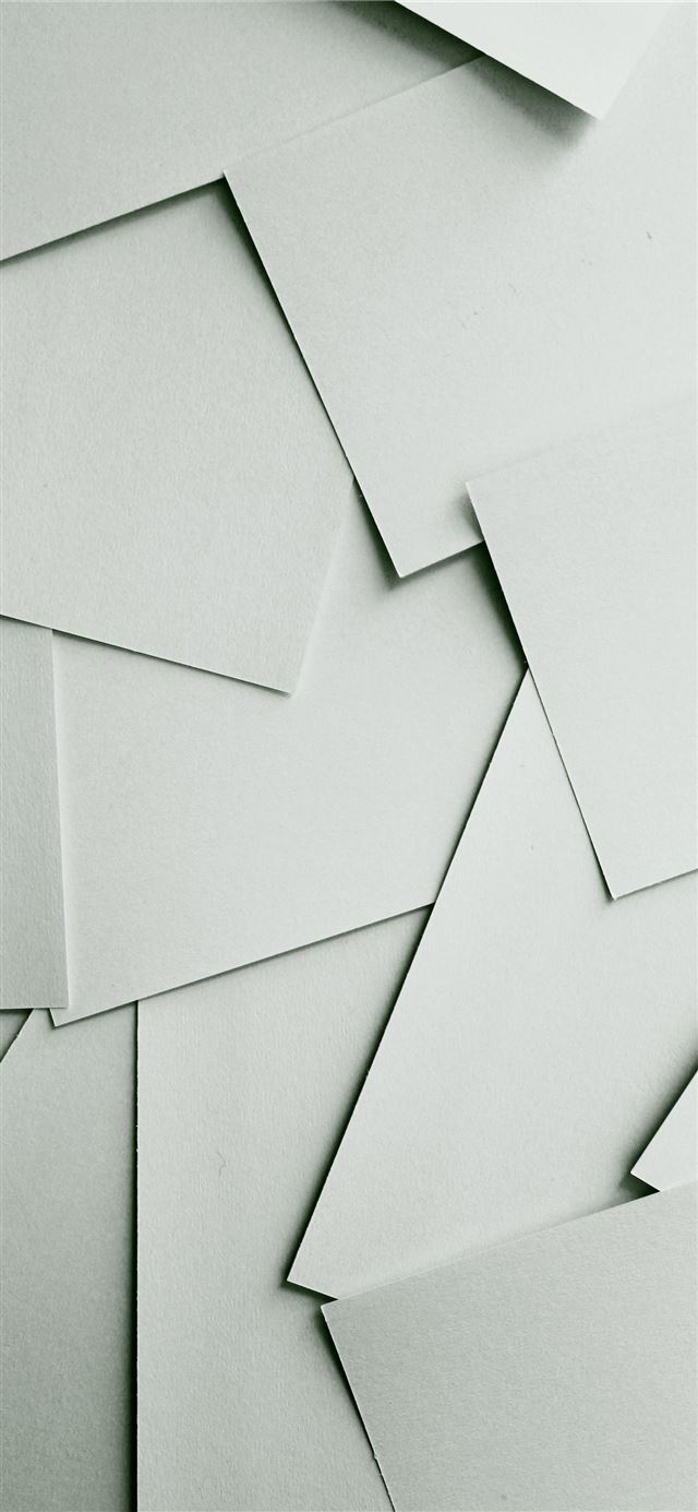 1125x2436 Scattered sheets of white paper covering the entir... -  iPhone 11 Wallpaper
