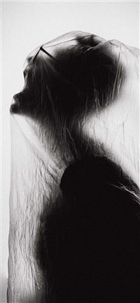 macro photography of person wrapped with clear pla... wallpaper