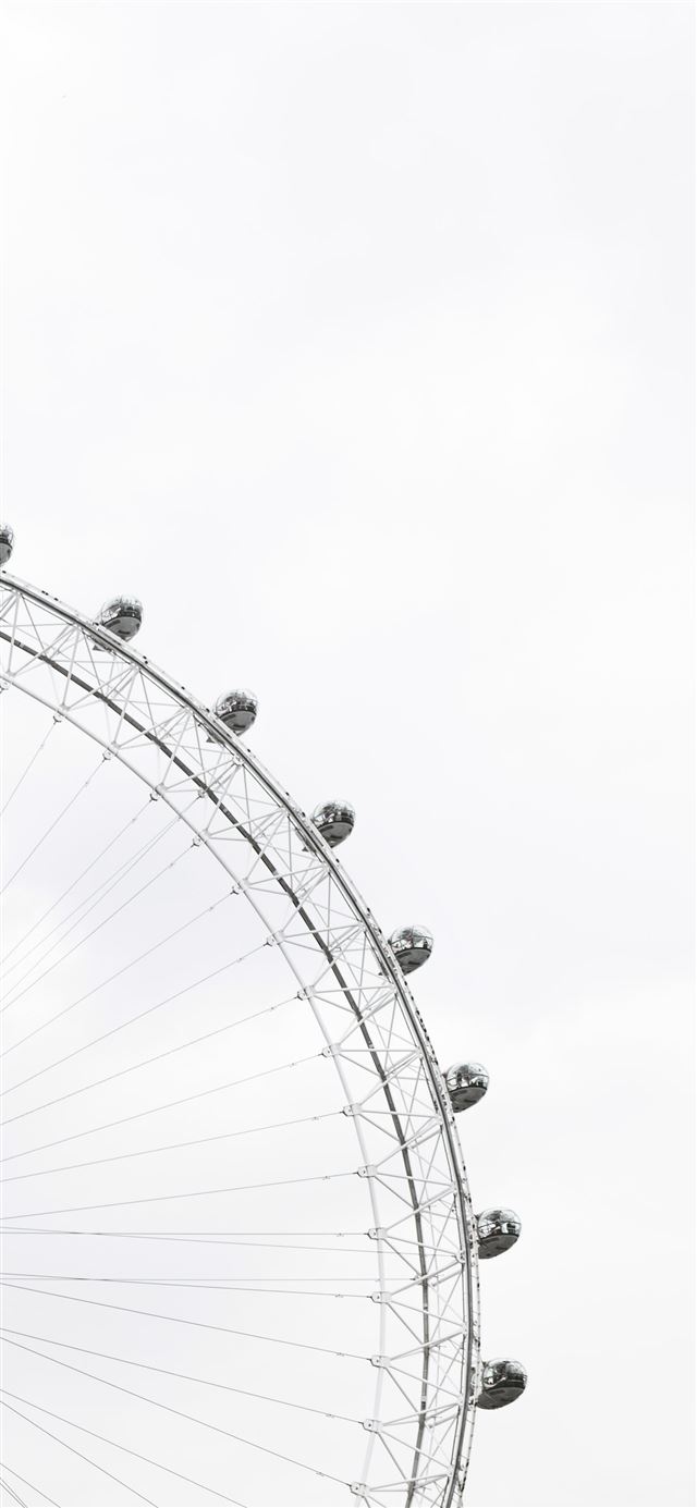 1125x2436 Part of a ferris wheel with enclosed cars for ridi... - black iPhone 11 Wallpaper