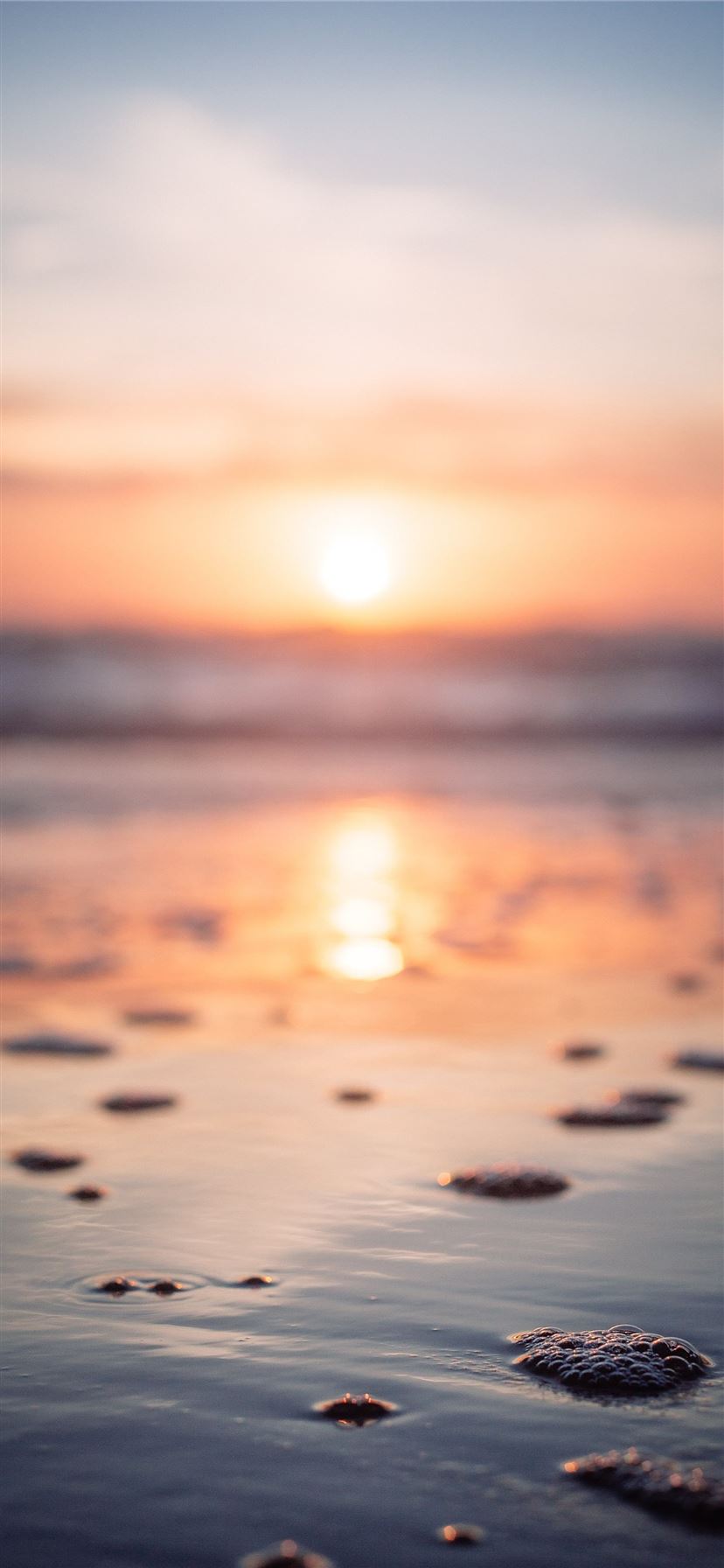 reflection of sunset on beachshore iPhone 11 wallpaper 