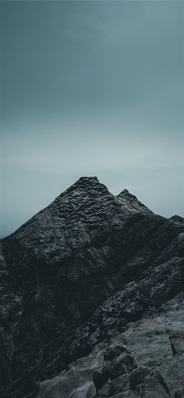 1125x2436 rock mountain under cloudy sky - grey iPhone 11 Wallpaper