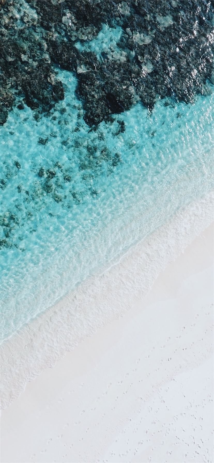 Bạn là một người yêu thích bãi biển và ảnh chụp góc cao? Thì không thể bỏ qua những bức ảnh high angle chụp với iPhone X. Hình nền với bãi biển đẹp và tinh tế, cùng với sự hoàn hảo của chiếc điện thoại sẽ tạo ra một hình ảnh tuyệt đẹp, đầy sống động cho máy của bạn.