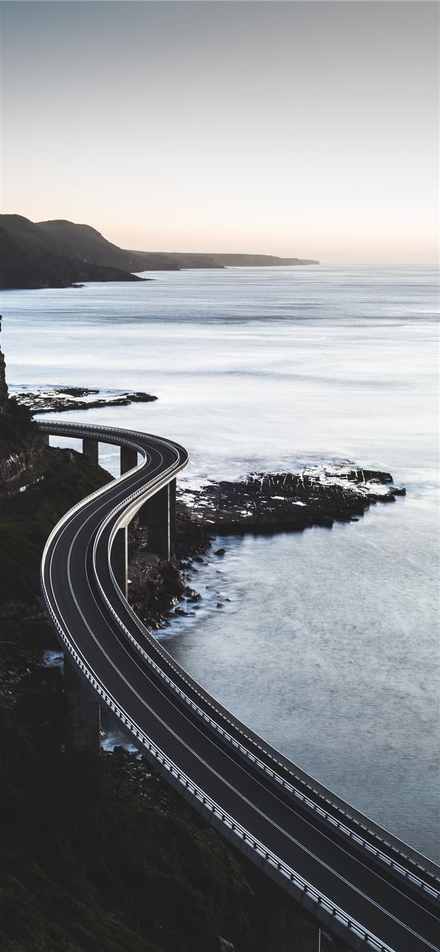 1125x2436 bird's eye view of curved road - water iPhone 11 Wallpaper