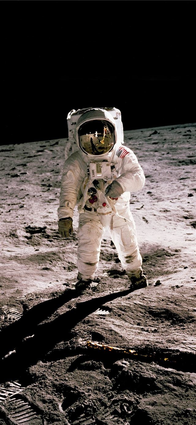 1125x2436 astronaut standing on gray sand - moon iPhone 11 Wallpaper