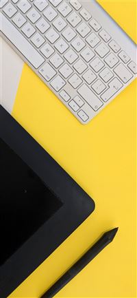 gray Apple wireless keyboard beside black tablet c... wallpaper