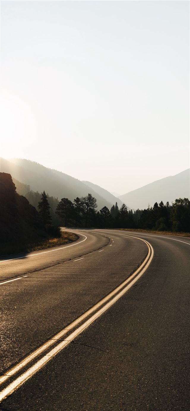 1125x2436 empty curved road - winter iPhone 11 Wallpaper