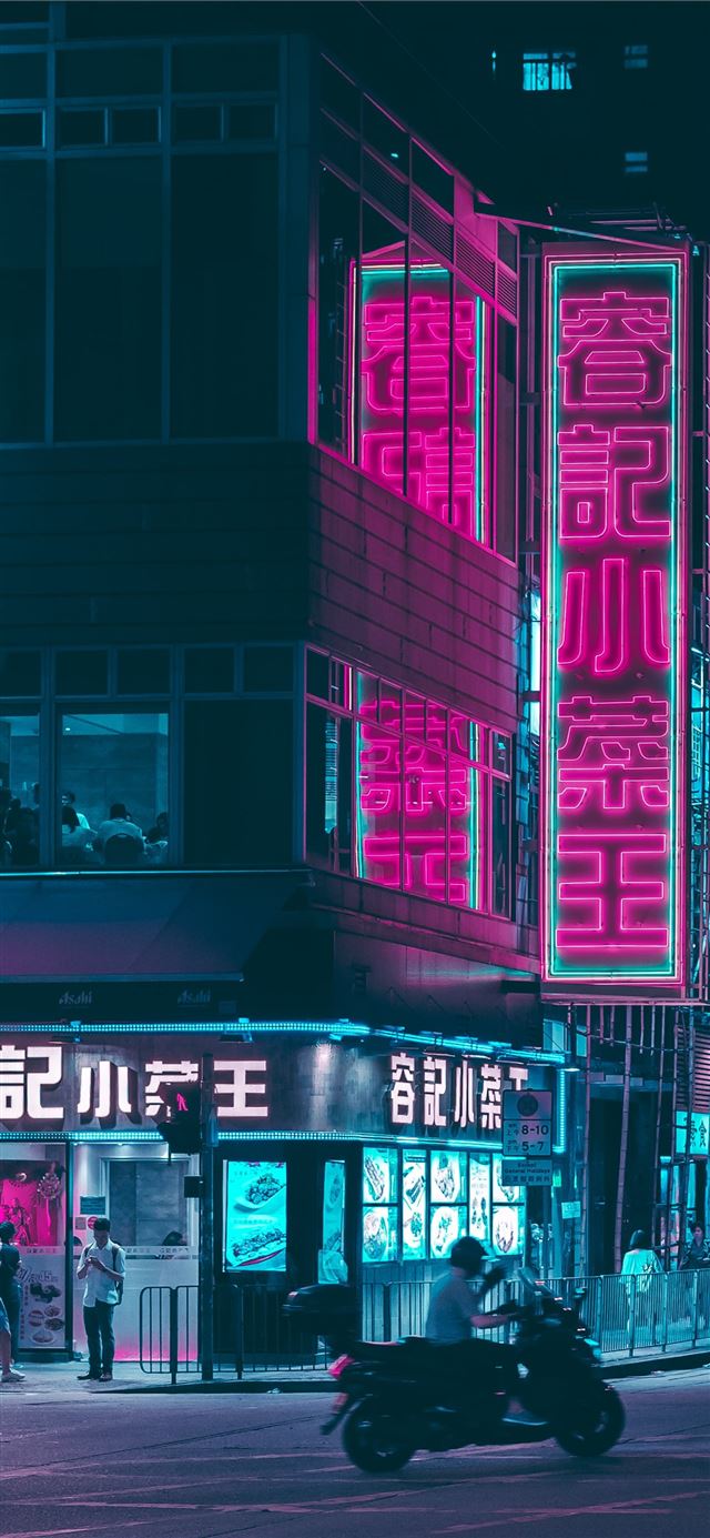 1125x2436 man riding motor scooter near store - hong kong iPhone 11 Wallpaper