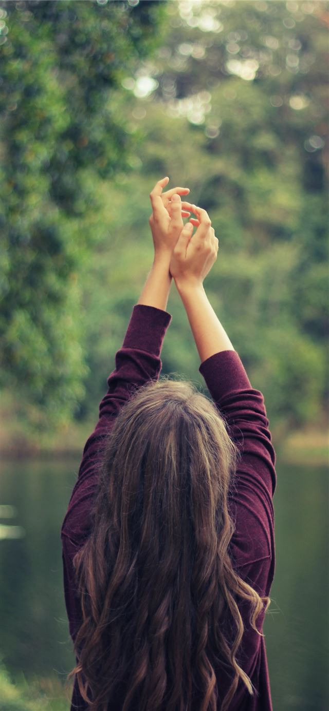 1125x2436 woman raising both of her hands - girl iPhone 11 Wallpaper