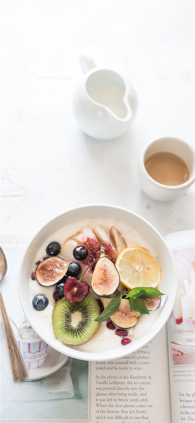 1125x2436 white ceramic plate beside gray steel spoon - white iPhone 11 Wallpaper