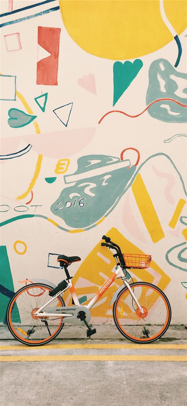 1125x2436 photography of orange and white bicycle - colorful iPhone 11 Wallpaper