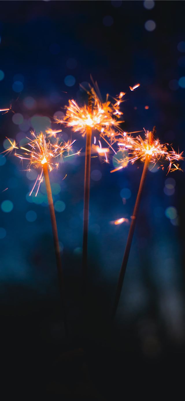 1125x2436 three sparkler sticks - night iPhone 11 Wallpaper