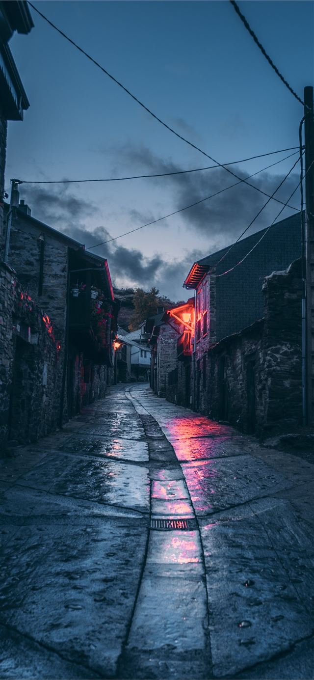 1125x2436 empty street with red and white houses during dayt... - road iPhone 11 Wallpaper