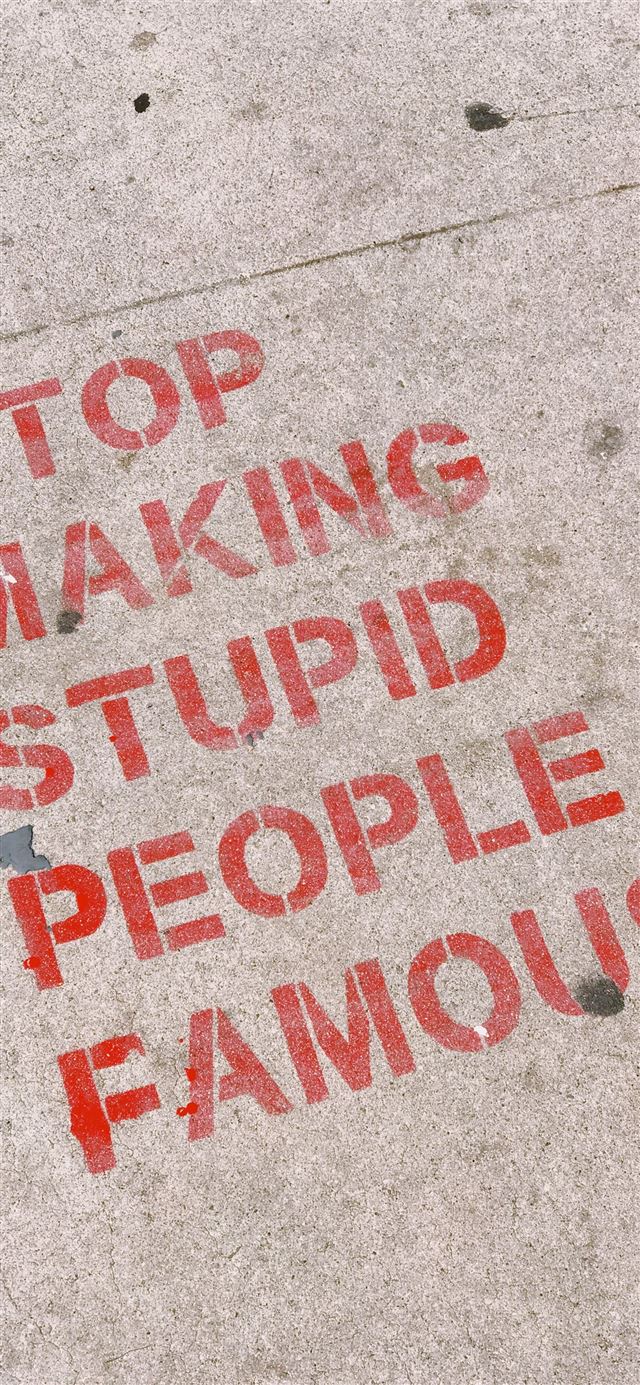 1125x2436 stop making stupid people famous signage - los angeles iPhone 11 Wallpaper