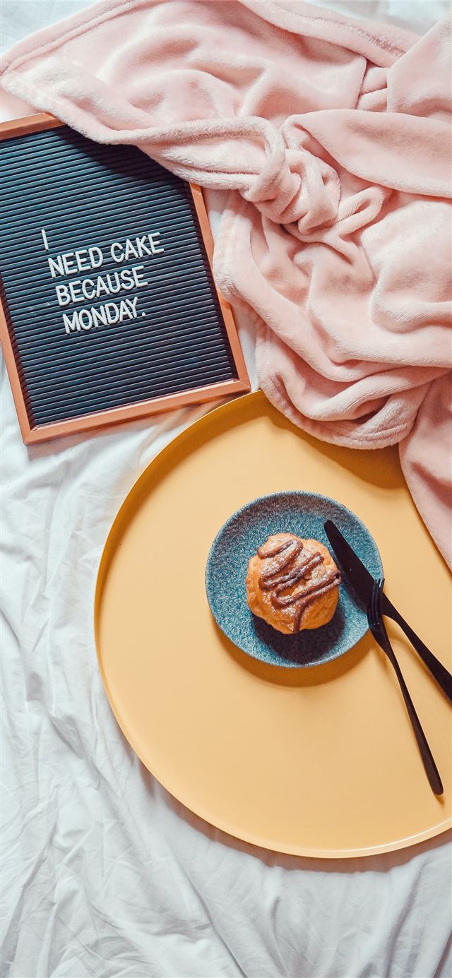 1125x2436 muffin beside knife and fork on saucer beside blan... -  iPhone 11 Wallpaper