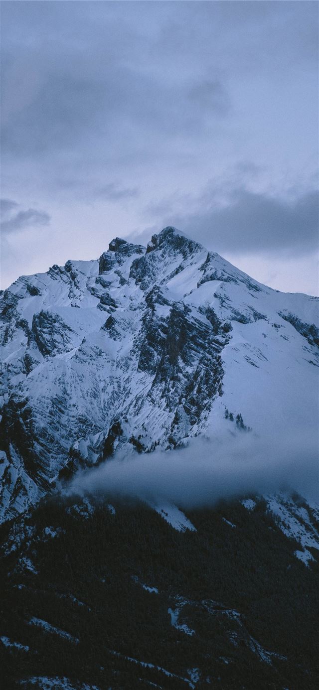 1125x2436 snow covered mountain under cloudy sky during dayt... - mountain iPhone 11 Wallpaper