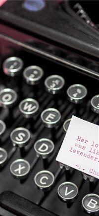 black and white typewriter with white printer pape... wallpaper