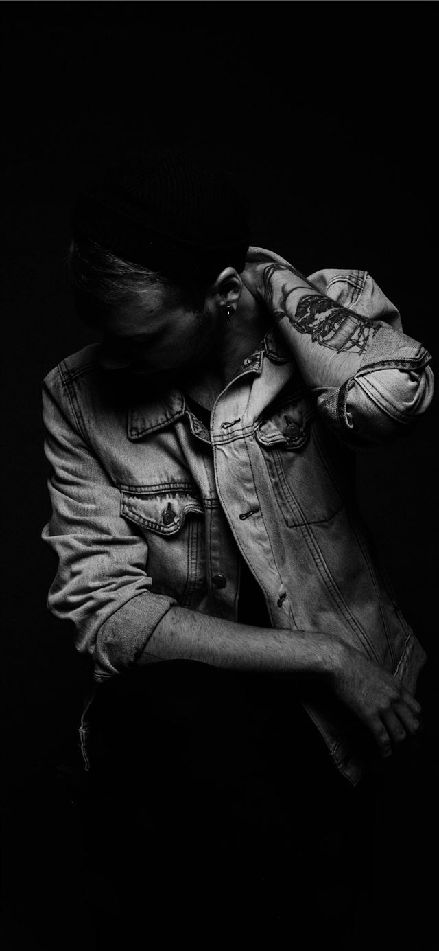 1125x2436 woman wearing denim jacket - dark (black) iPhone 11 Wallpaper
