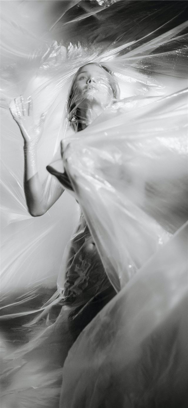 1125x2436 grayscale photography of woman covered in plastic - abstract iPhone 11 Wallpaper