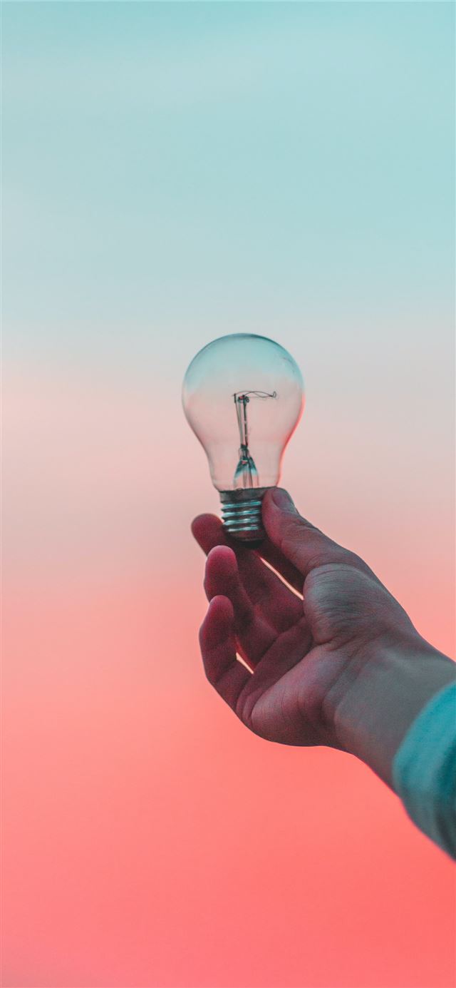 1125x2436 person holding light bulb - mexico iPhone 11 Wallpaper