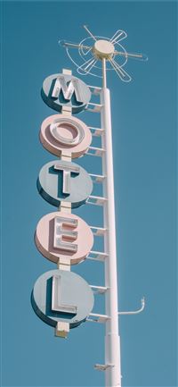 white and teal metal motel signage iPhone 11 wallpaper