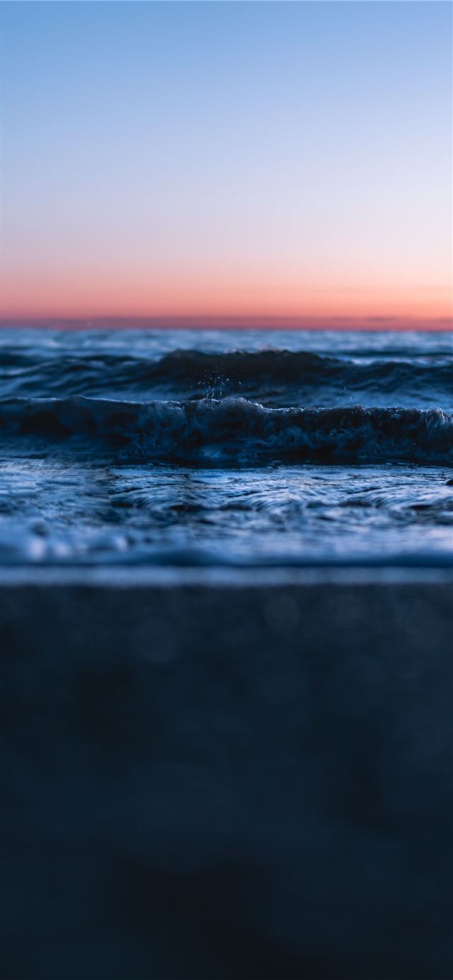 1125x2436 ocean waves crashing on shore during sunset - sunset iPhone 11 Wallpaper
