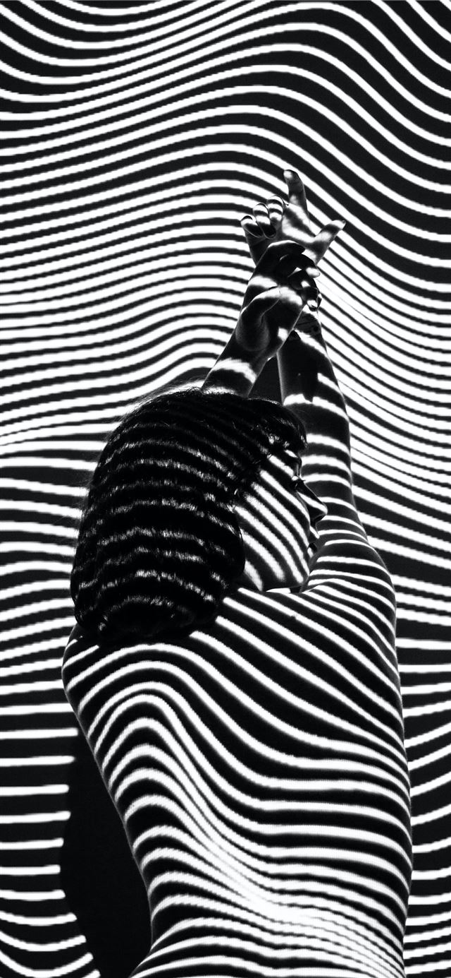 1125x2436 woman raising both arms with stripe light color - beauty iPhone 11 Wallpaper