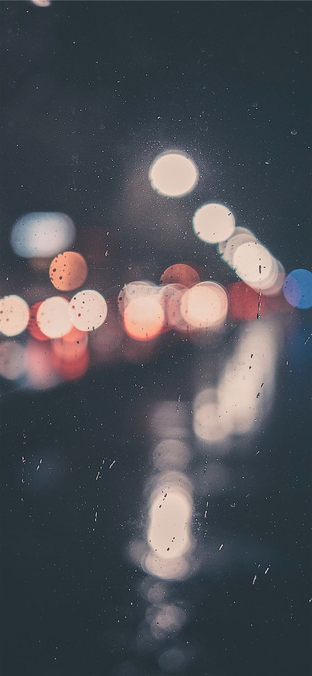 1125x2436 bokeh photography of clear glass panel with light - dark (black) iPhone 11 Wallpaper