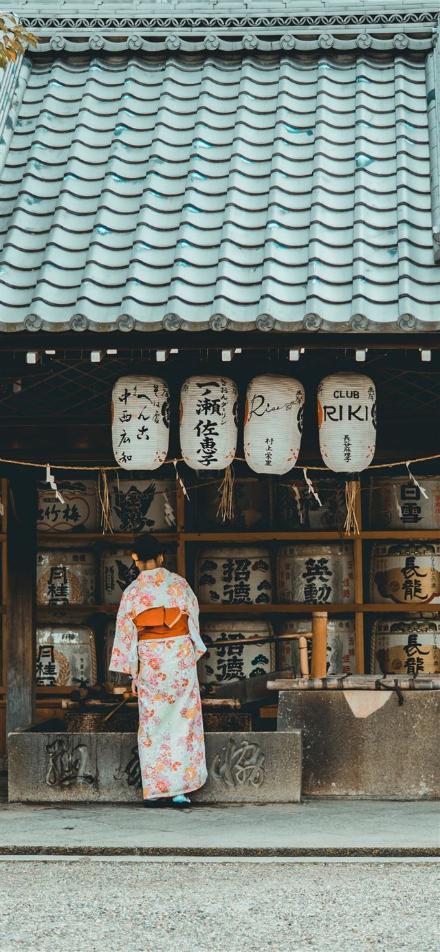 1125x2436 woman wearing orange and white kimono dress standi... - japan iPhone 11 Wallpaper