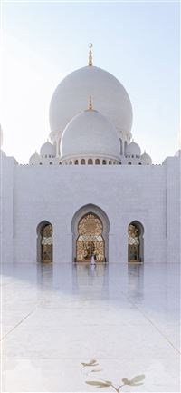 white mosque under gray sky during daytime iPhone 11 wallpaper