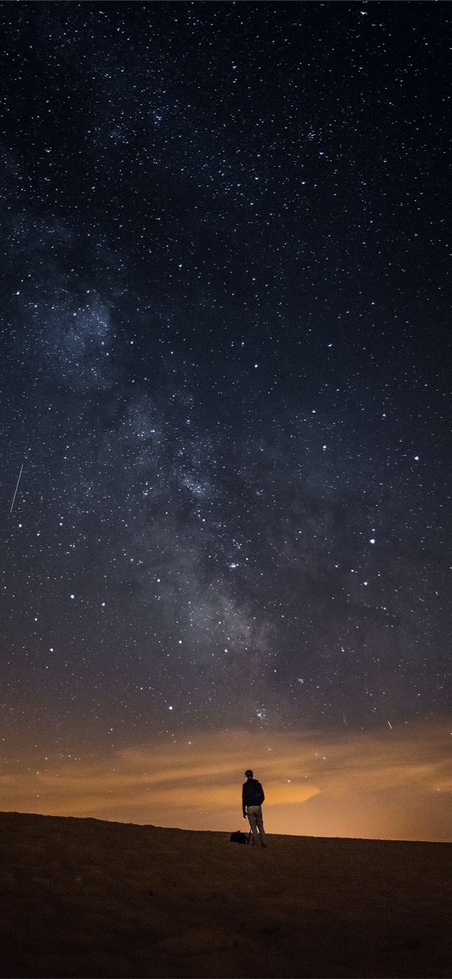 1125x2436 person looking at the milkyway - outer space iPhone 11 Wallpaper