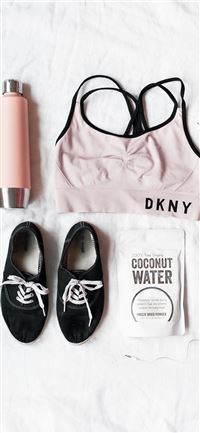 pair of black lace up shoes near DKNY sport bra iPhone 11 wallpaper