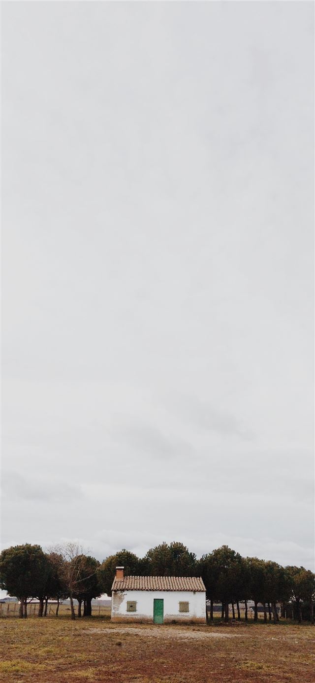 1125x2436 white house beside trees in front brown field - landscape iPhone 11 Wallpaper
