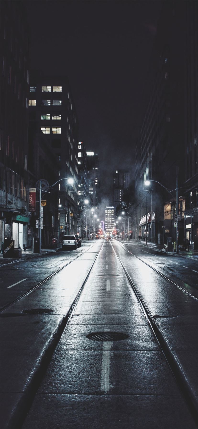empty road in city during night iPhone 11 wallpaper 