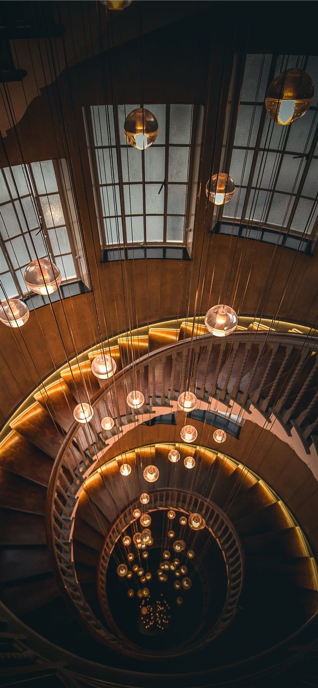 1125x2436 twirl stairs with chandeliers - orange iPhone 11 Wallpaper