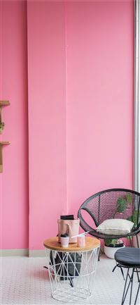 round white base glass top coffee table near two b... wallpaper