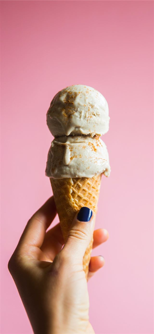 1125x2436 person holding ice cream on cone - pink iPhone 11 Wallpaper