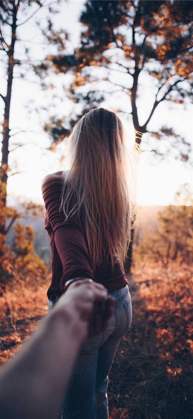 1125x2436 woman holding someone's hand - love iPhone 11 Wallpaper