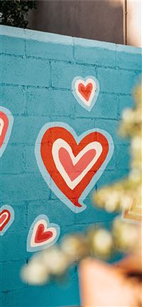 selective photo of red and white hearts graffiti wallpaper