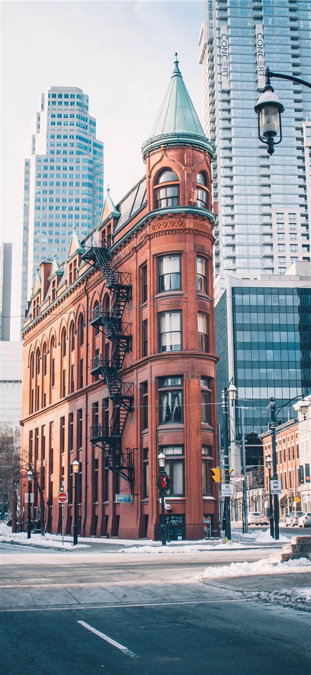 1125x2436 brown building near intersection - city iPhone 11 Wallpaper