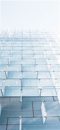close up photo of clear cubicles against white bac... iPhone 11 wallpaper